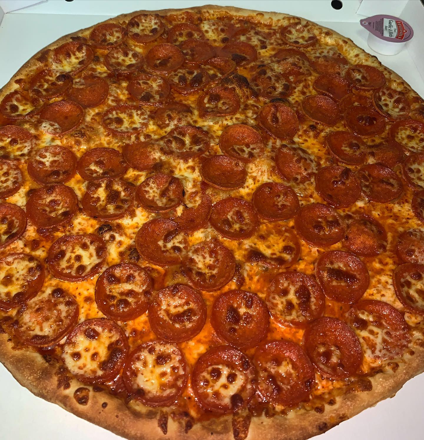 Double pepperoni pizza fresh from the oven